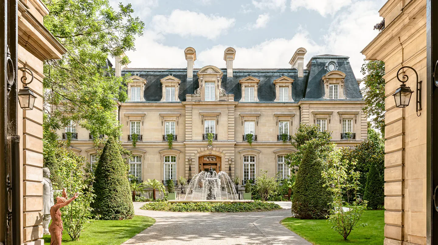 Exterior of Saint James Paris hotel in Paris with fountain and classic architecture